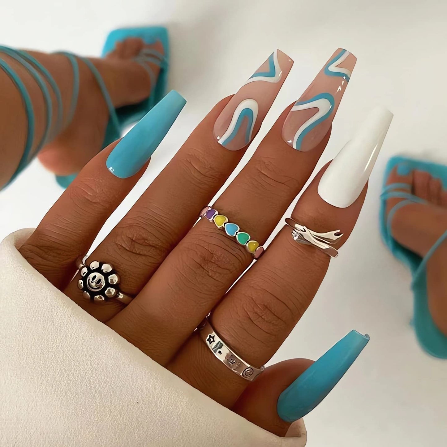 RTKHFZE Summer Acrylic Press on Nails Long Blue Fake Nails French Extra Long Acrylic Nails with Blue Swirl Designs Glossy Artificial Nails for Women and Girls 24PCS
