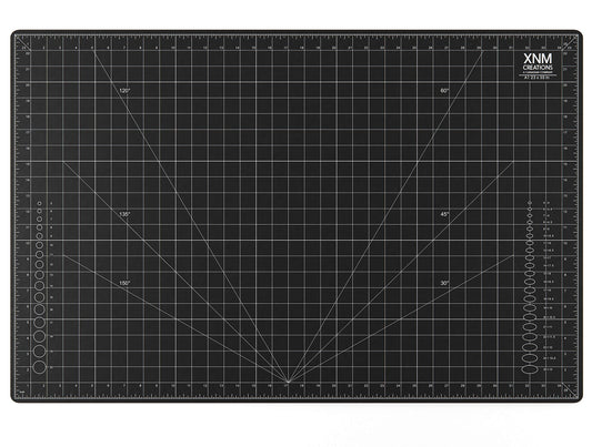XNM Premium Self Healing Cutting Mat - 24 Inches by 36 inches - A1, 3 Layer Quality PVC Construction - Dual Sided, Imperial and Metric Grid Lines - Perfect for Cutting, Sewing, and Crafts